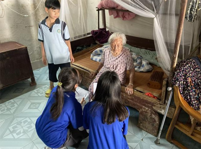 閩南師大法學院2025暑期“三下鄉”：方言架橋探百歲，青春執筆寫安康