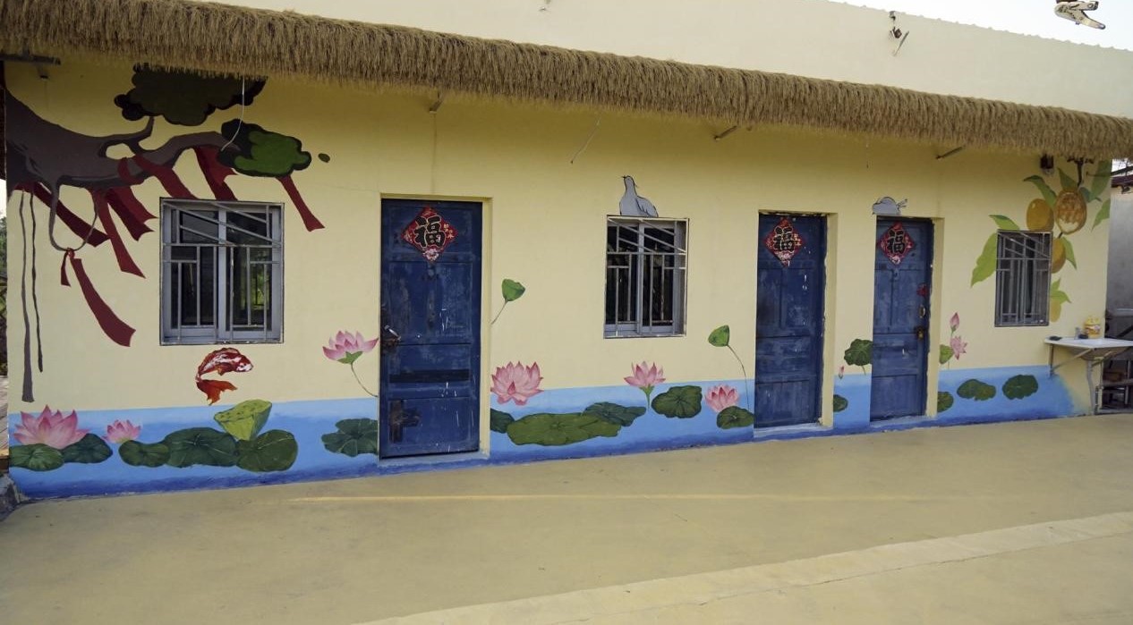 圖為實踐隊繪制墻繪成果展示